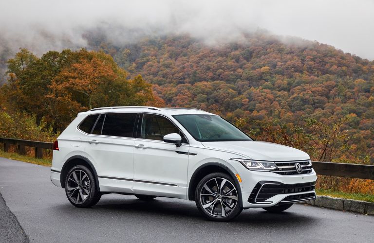 A 2022 Volkswagen Tiguan backdropped by trees